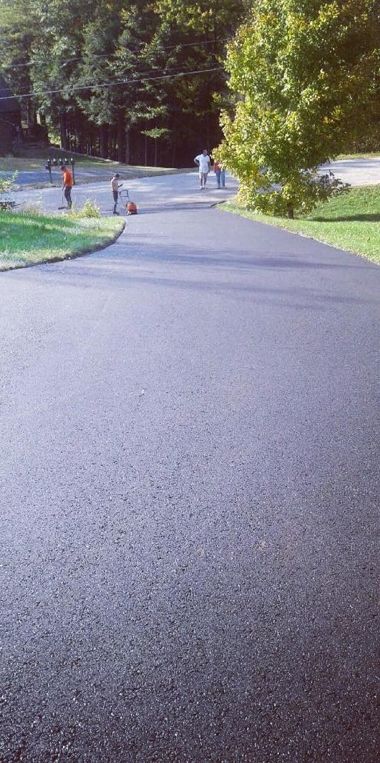 New asphalt driveway after paving