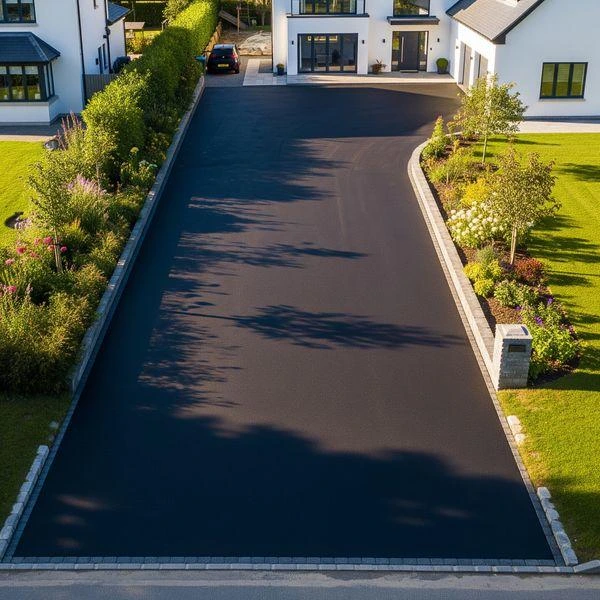Newly paved residential asphalt driveway