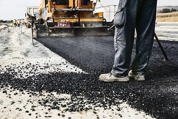 Ridgeline paving crew working on fresh asphalt